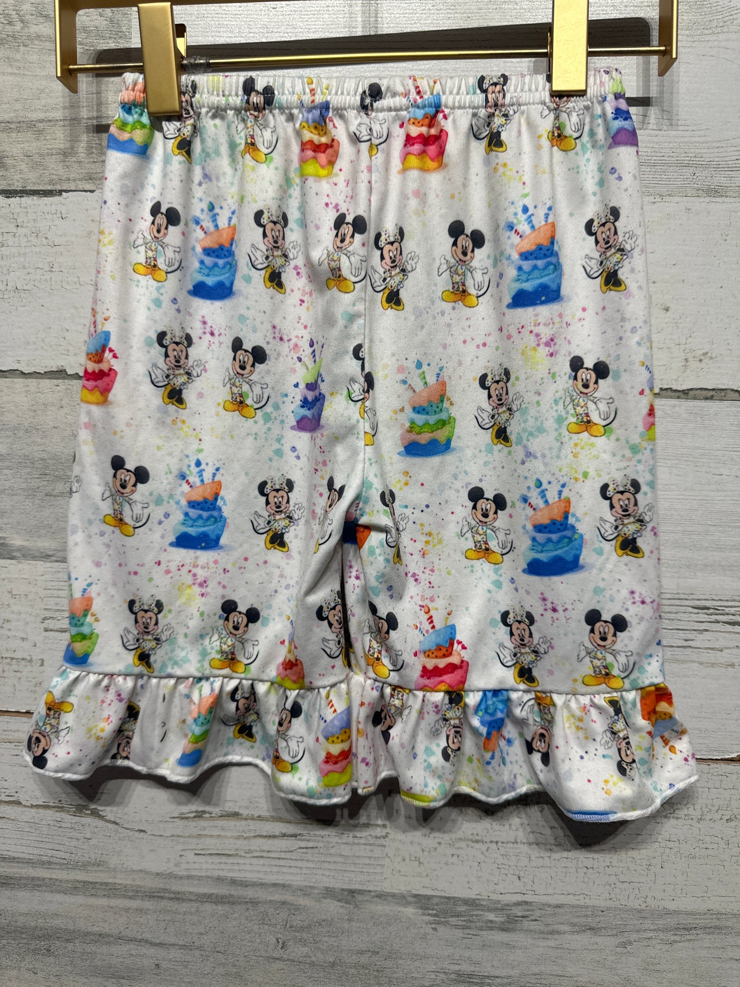 Girls Size 7-8 Minnie and Mickey Birthday Cake Ruffle Shorts - Very Good Used Condition