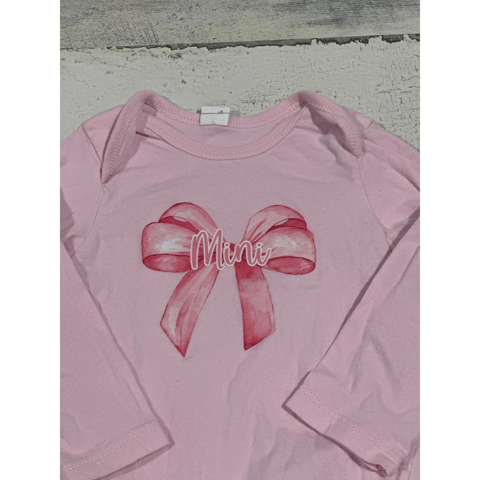 Unbranded Bodysuit Girls 12-18M Pink Bow Graphic Long Sleeve EUC1