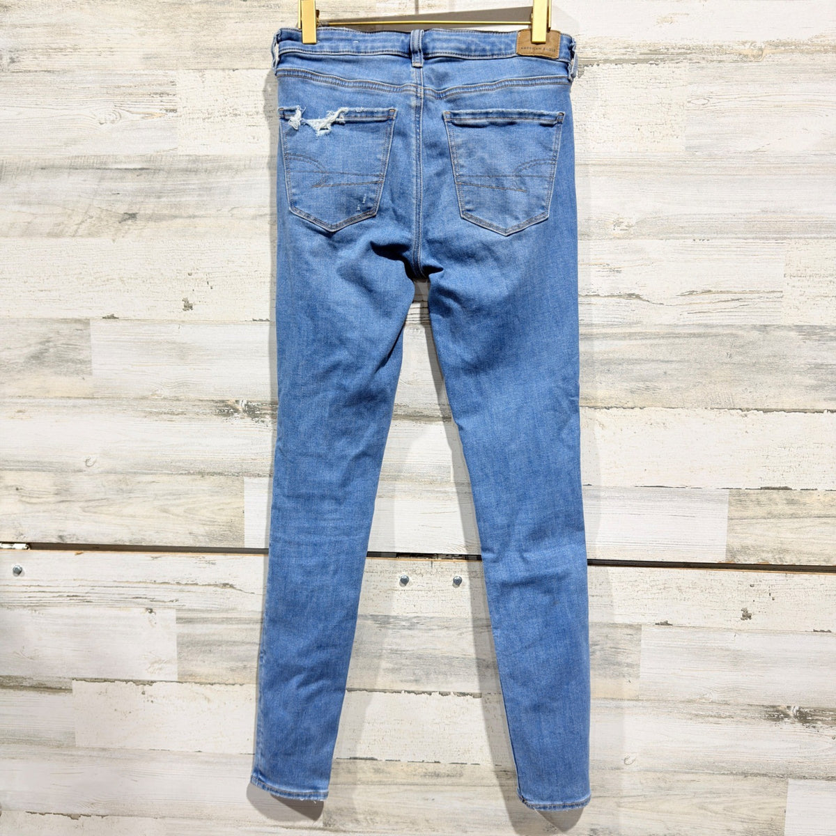 American Eagle Next Level Stretch Jegging Women 4 Long Blue Distressed Denim4