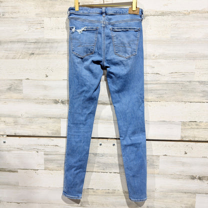American Eagle Next Level Stretch Jegging Women 4 Long Blue Distressed Denim4