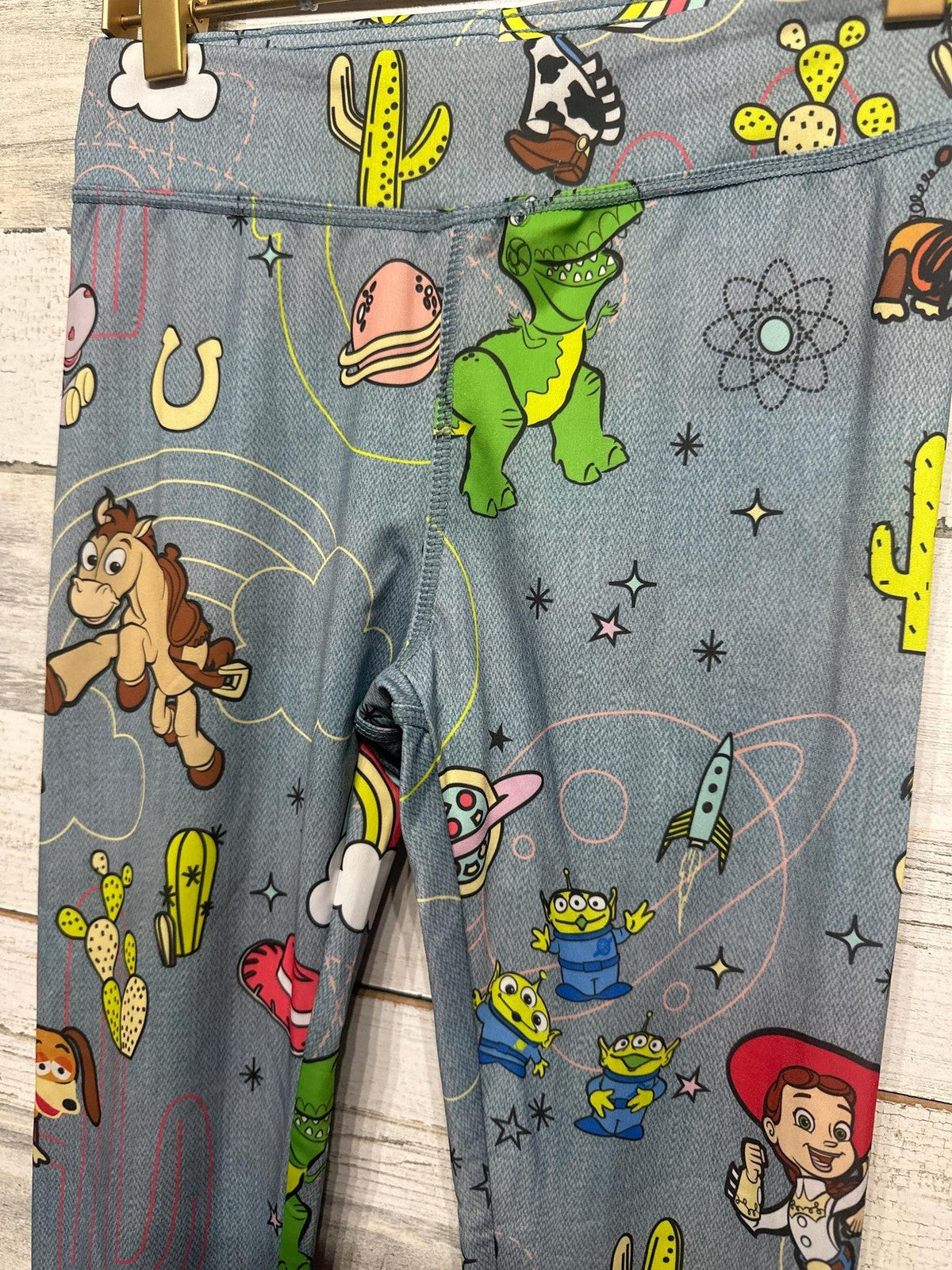 Disney Leggings Girls 9/10 Blue Toy Story Jessie Rex All Over Print EUC1