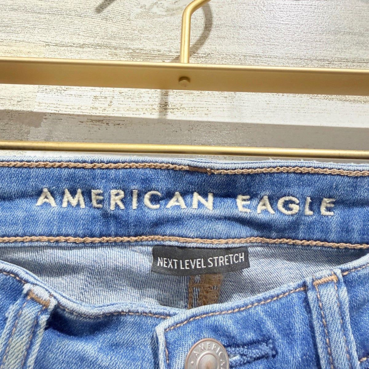 American Eagle Next Level Stretch Jegging Women 4 Long Blue Distressed Denim1