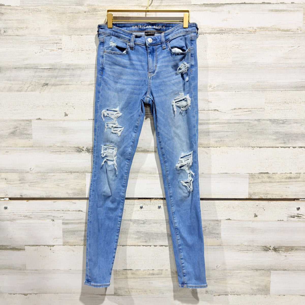 American Eagle Next Level Stretch Jegging Women 4 Long Blue Distressed Denim0