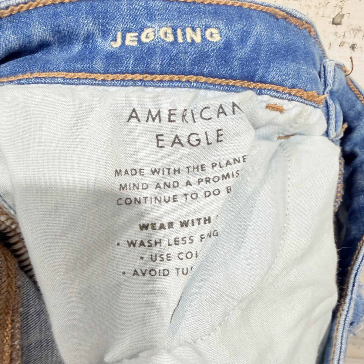 American Eagle Next Level Stretch Jegging Women 4 Long Blue Distressed Denim7