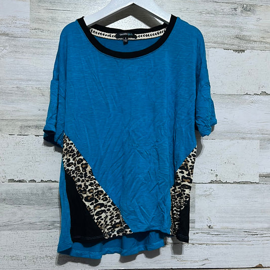 Girls Size Medium Takara Girls (fits like 7/8) soft blue and leopard shirt - good used condition